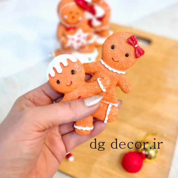 مجسمه آویز کوکی دختر و پسر کریسمسی